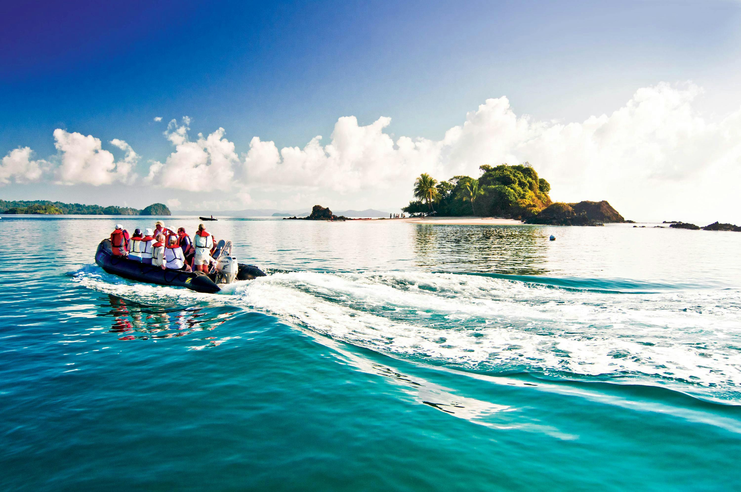 Guests explore by zodiac mangrove-lined beaches and islands in San Jose, Costa Rica, Central America