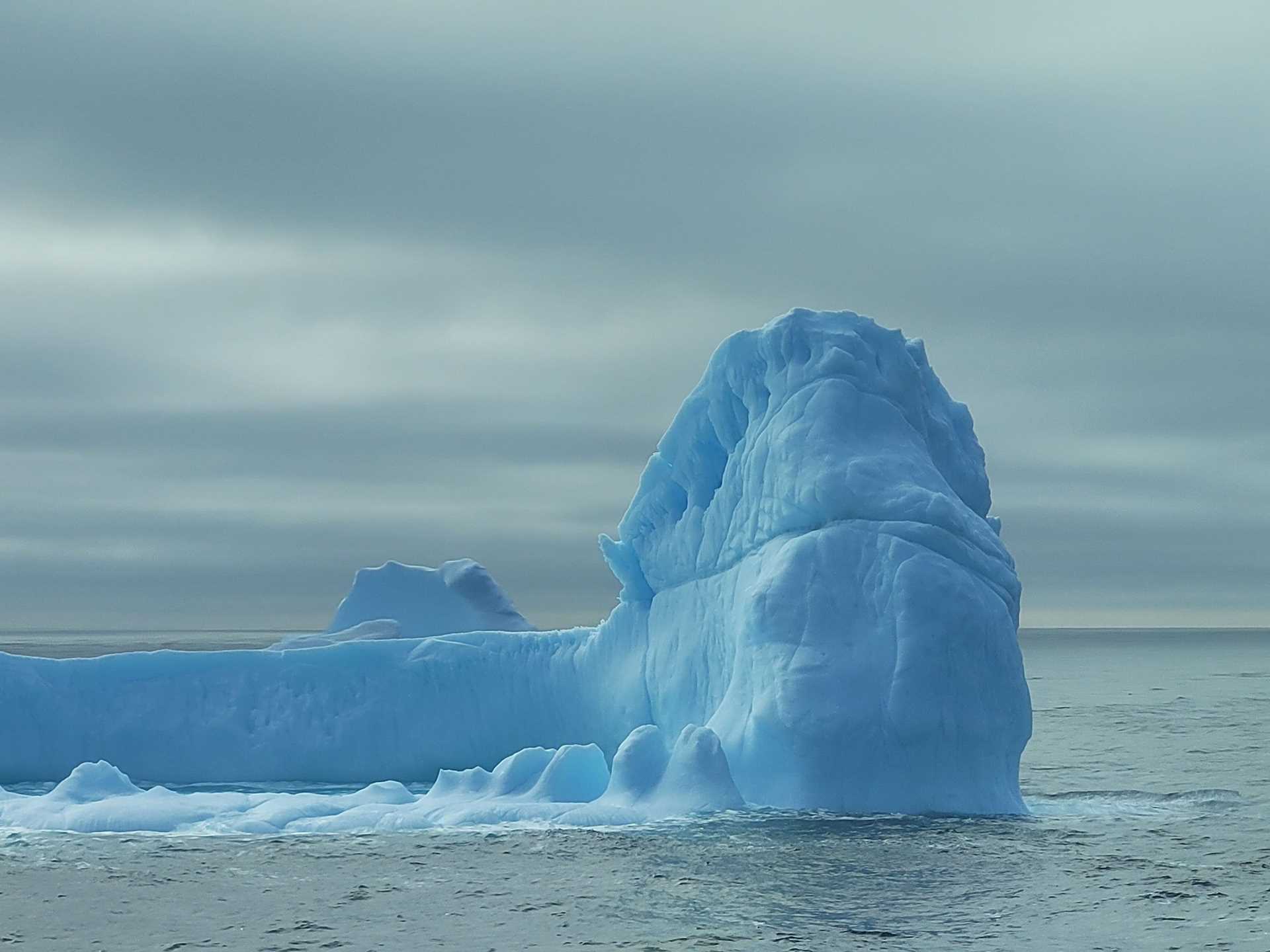 a large blue iceberg in the drake passage