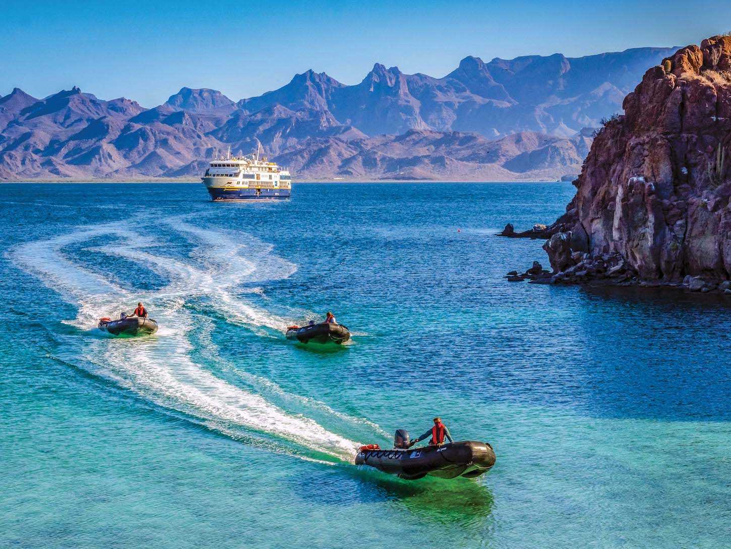 Zodiacs and staff coming ashore.jpg